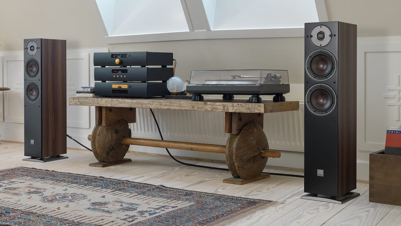 DALI Oberon 5 Floorstanding Loudspeakers Front Lifestyle Audio System in dark walnut