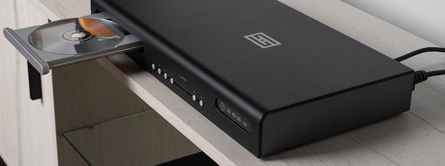 Schiit Audio URD Close-up With Remote and CD Slot Schiit Audio URD CD Player Black Tray Open Lifestyle